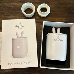 Baby’s brew portable bottle warmer! Comes with 2 attachments!